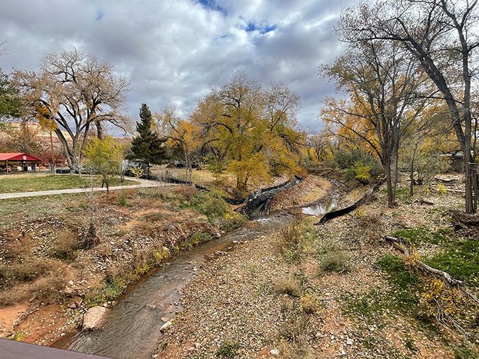 Crews put riprap in place along the banks and streambed of Mill Creek to help stabilize the channel 